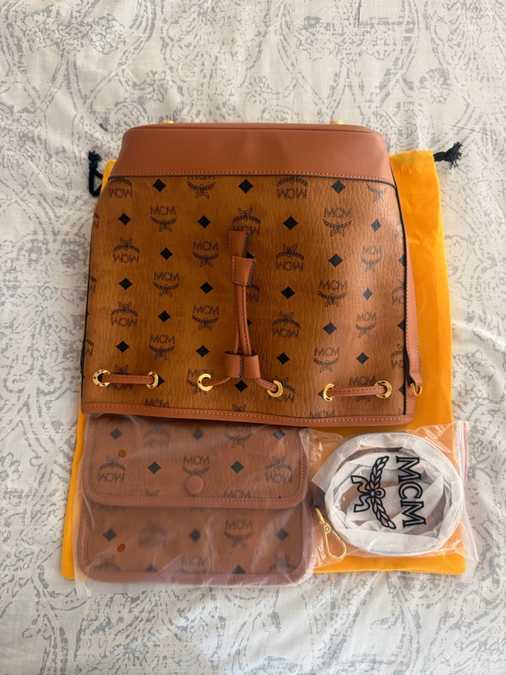 MCM Brown Visetos Bucket Handbag with Gold Accents